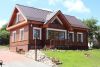 NAUJ�J� MET� SUTIKIMAS. Nakvyn�, pokyli� sal�, Jakuzzi ir sauna sodyboje R&R Spa Villa Trakai